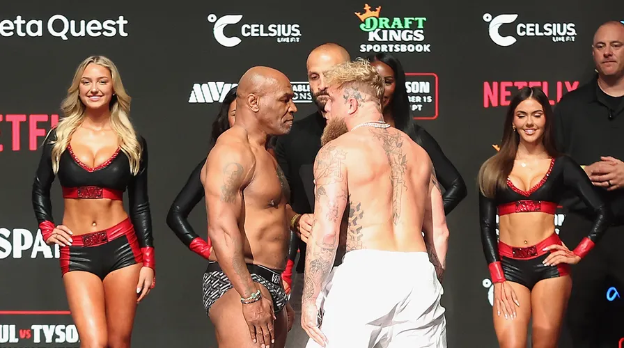 Jake paul and Mike Tyson face off